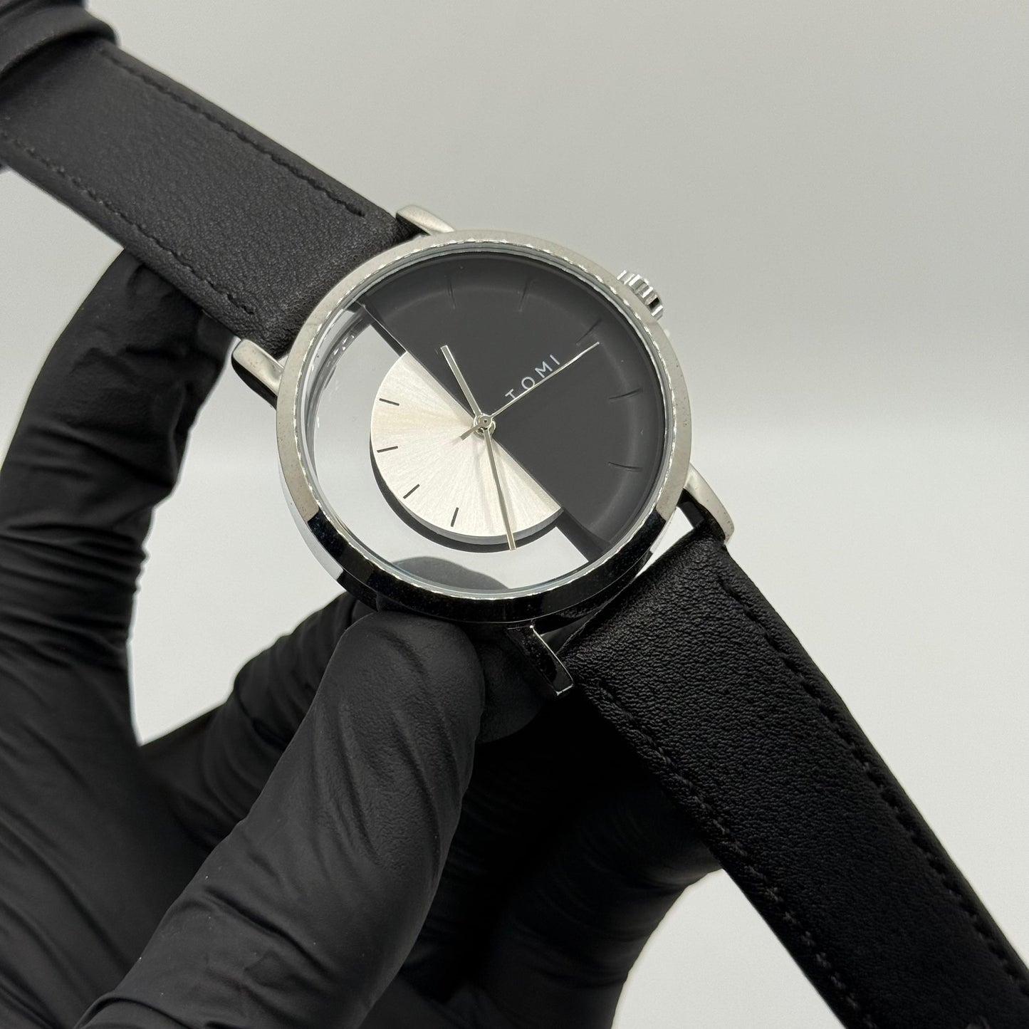 TOMI transparent dial with black leather strap - watch forge
