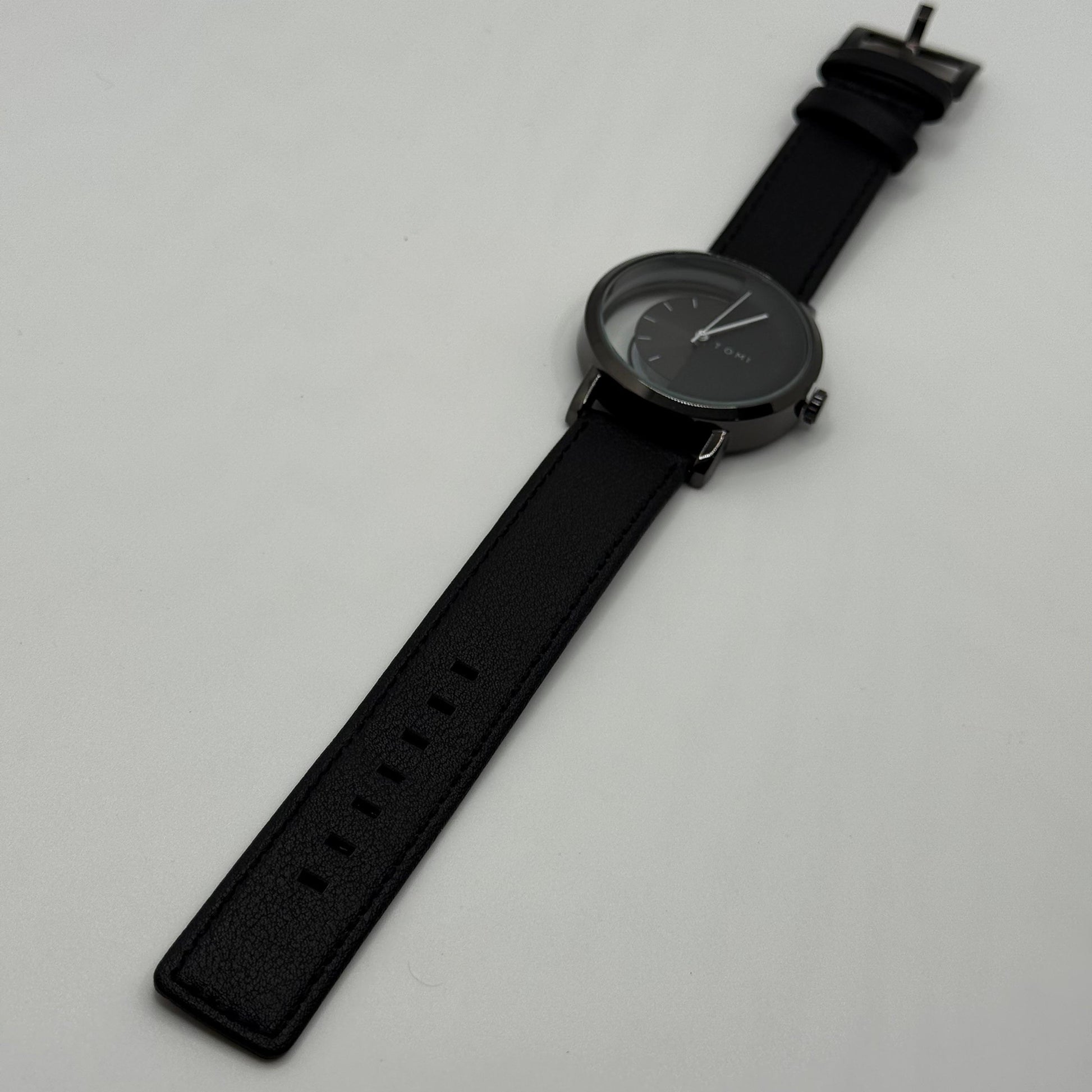 TOMI transparent dial with black leather strap - watch forge