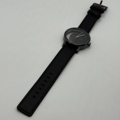 TOMI transparent dial with black leather strap - watch forge