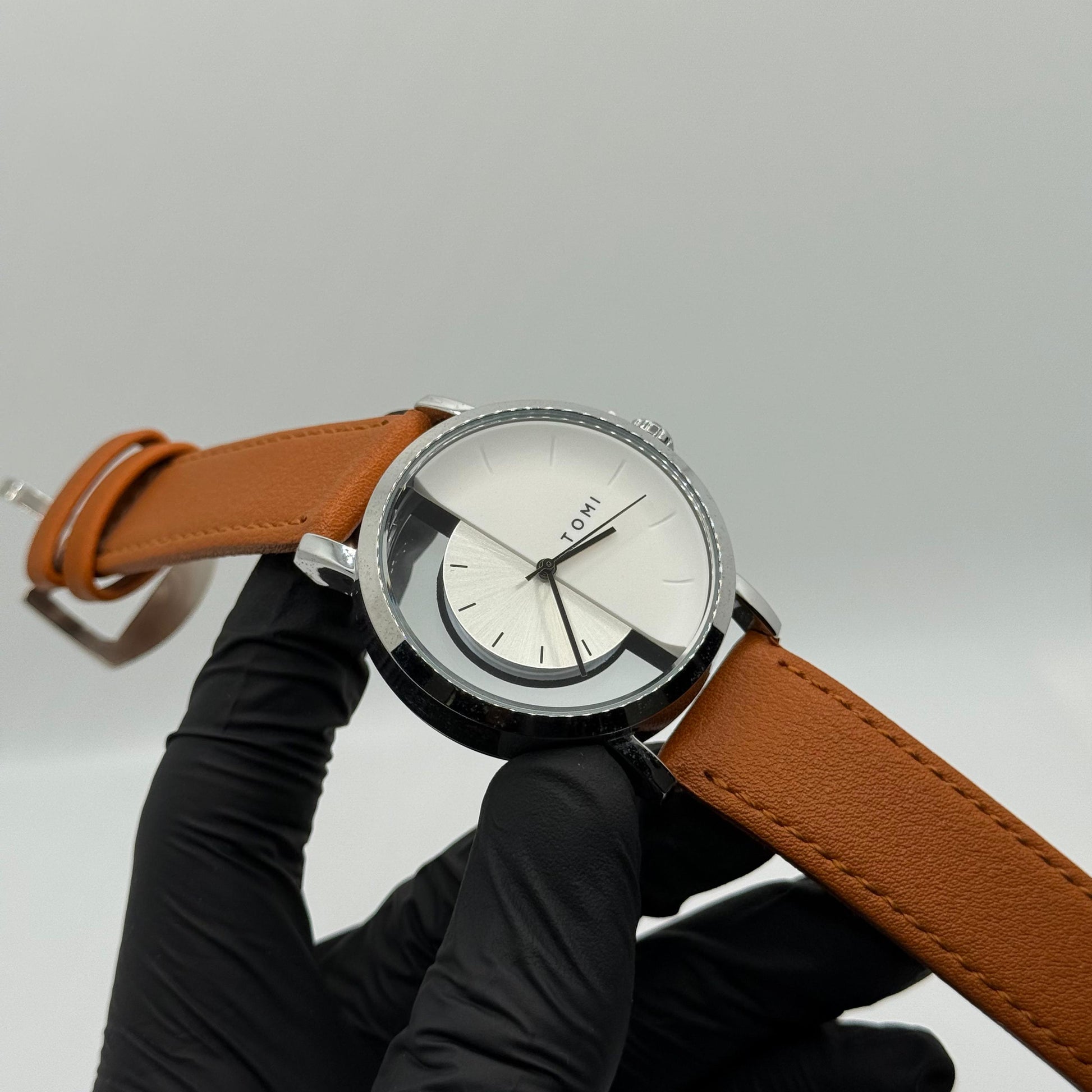 TOMI transparent dial with bronze leather strap - watch forge