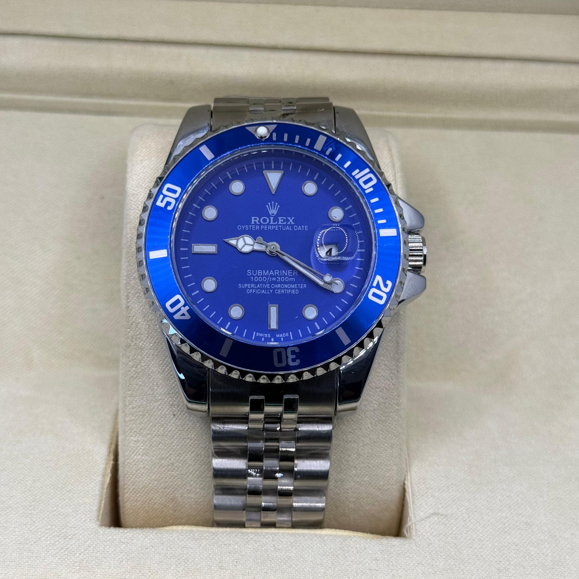 Rolex submariner silver with blue rotating dial with date - watch forge